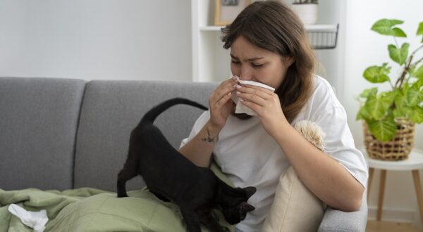 side-view-sick-woman-couch-home